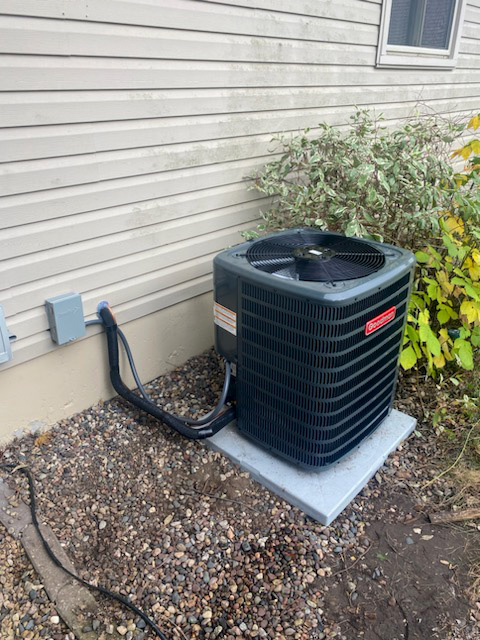 An outdoor Goodman air conditioning unit installed by Niebuhr Plumbing, Heating, and Air Conditioning in La Crosse, WI.