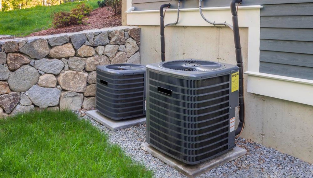 A Goodman air conditioning unit outside of a home.