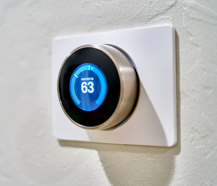 A smart Nest thermostat to control home temperatures.