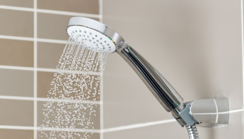 Silver showerhead produces cold water after shower runs out of hot water.